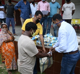 Distribution of food items in the adopted villages 